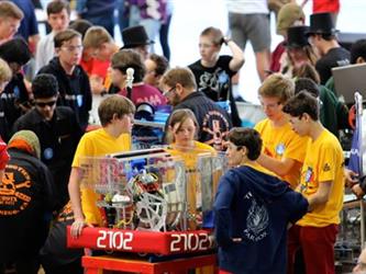 Students with a machine